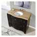 Black vanity with curved wood top, white sink, and chrome fixtures, sitting on tiled floor with textured rug.