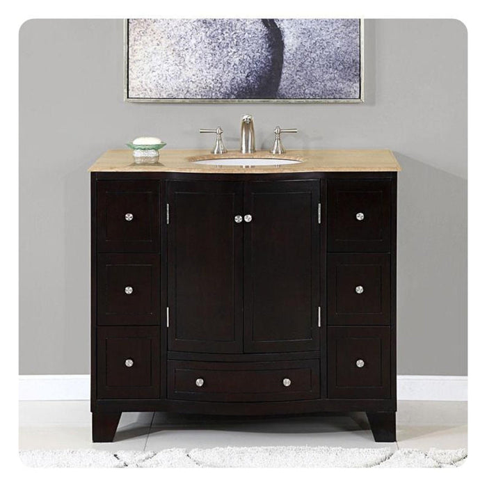 Dark wood bathroom vanity with beige marble top, centered sink, and six drawers, under abstract black and white artwork