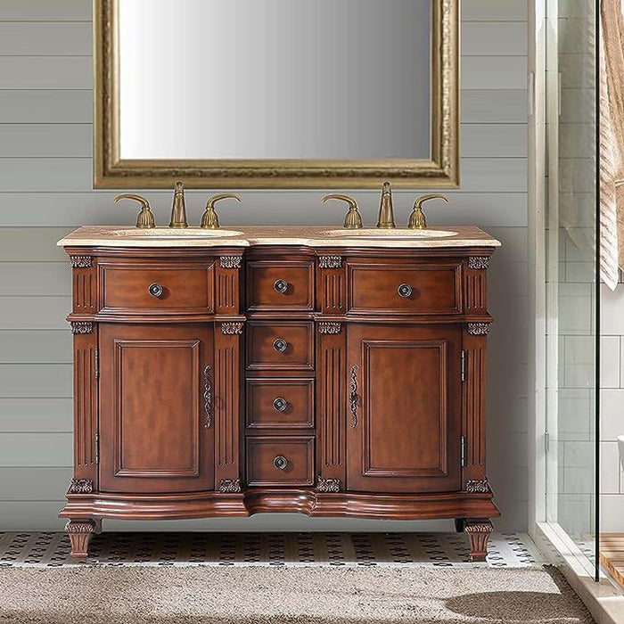 Elegant wooden double vanity with rich brown finish, two sinks, brass fixtures, and ornate carved details, set against shiplap wall.