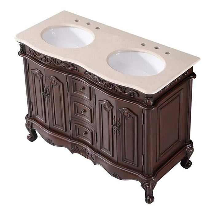 Ornate dark wood bathroom vanity with curved cabinets, decorative carved details, and a cream-colored stone top with two oval sinks.