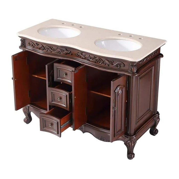 Antique-style wooden bathroom vanity with ornate carved details, two sinks, and three open drawers on cabriole legs.