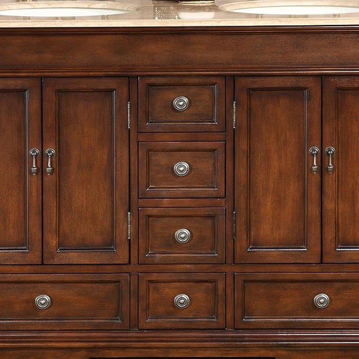 Rich mahogany bathroom vanity with raised panel doors, three small drawers in center, and four lower drawers, featuring antique bronze round drawer pulls.