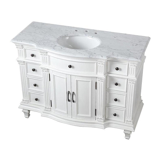 White bathroom vanity with marble top, six drawers, center cabinet, and oval undermount sink.