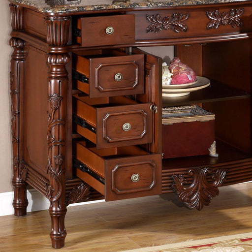 Ornate wooden furniture with three open drawers, carved floral details, marble top, and decorative turned leg.