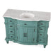 Vintage teal bathroom vanity with marble top, six drawers, and central cabinet doors with ornate carved details.