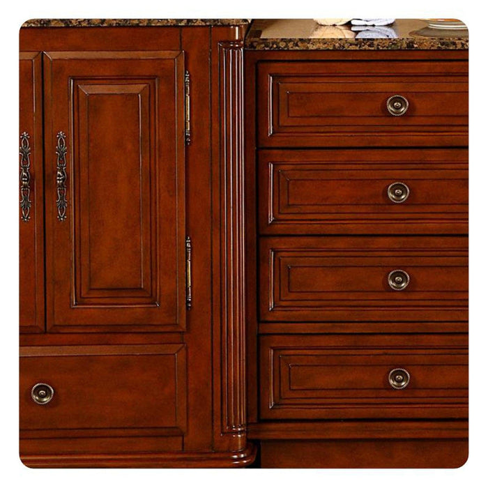 Rich cherry wood cabinetry with ornate handles, featuring a cabinet door and four drawers with decorative round brass knobs.