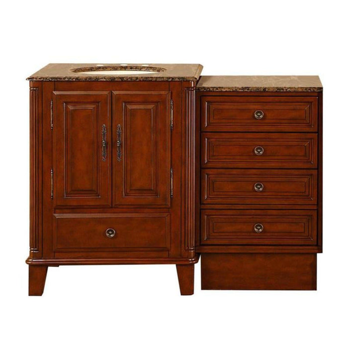 Cherry wood bathroom vanity with marble top, featuring cabinet doors and four drawers with ornate hardware