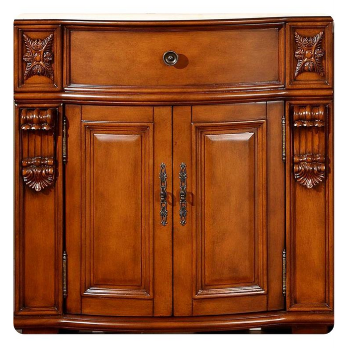 Ornate wooden cabinet with decorative carved details, curved edges, and two-door storage with elegant metal handles.