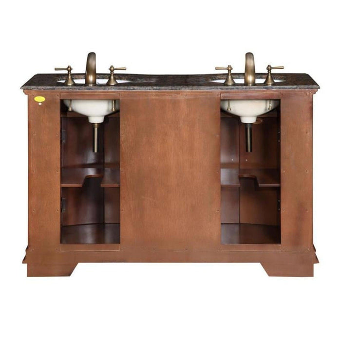 Double vanity with wood cabinet, marble top, bronze faucets and white sinks, storage shelves visible on sides.