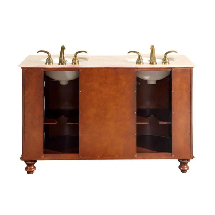 Wooden double vanity with marble top, three gold faucets, and two white sinks on turned legs