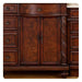 Rich mahogany wooden cabinetry with ornate carved details, decorative pulls, and central double doors with elegant handles.