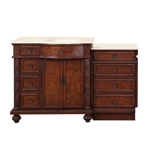 Rich mahogany bathroom vanity with marble top, featuring multiple drawers and central cabinet with ornate hardware and decorative carved details.