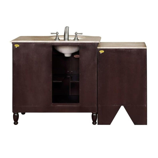 Dark wood bathroom vanity with beige stone top and oval white sink, featuring chrome faucet and cabinet storage.