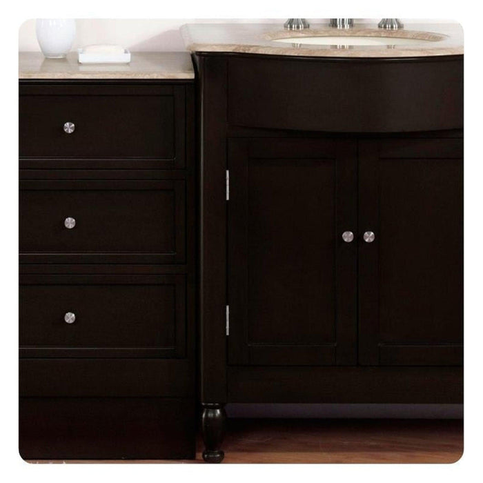 Dark wooden bathroom vanity with marble top, three drawers on left, cabinet with two doors on right, silver round knobs