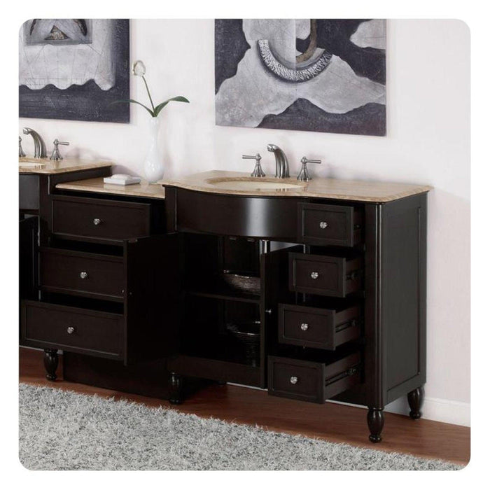Dark wood bathroom vanity with stone countertop, multiple drawers, and two sinks, flanked by abstract gray wall art and a white flower vase.