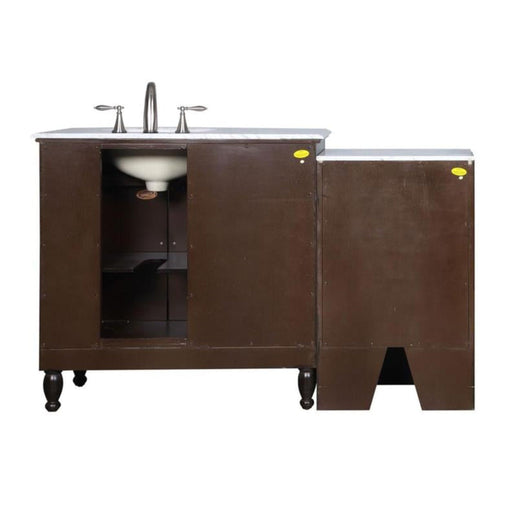 Dark brown bathroom vanity with white marble top, undermount sink, and chrome faucet, featuring open cabinet storage and decorative turned legs.