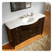 Dark wood bathroom vanity with white marble top, curved sink, and brushed nickel fixtures, sitting on a shaggy rug.
