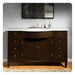 Dark wood bathroom vanity with marble top, white sink, and eight drawers, with abstract wall art hanging above.
