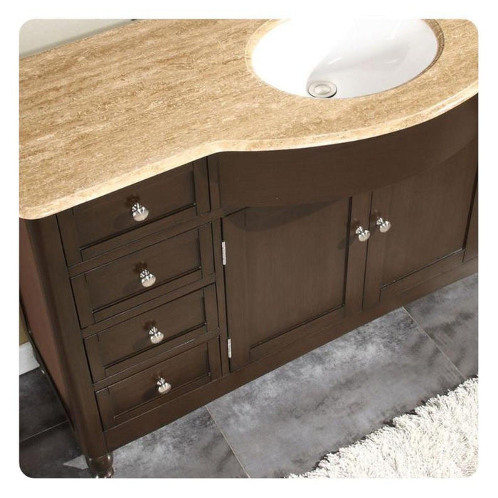 Dark wood bathroom vanity with curved stone countertop, white sink, and decorative round knobs on drawers and cabinet doors.