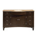 Dark wood bathroom vanity with curved beige marble top, center cabinet doors, and six drawers with silver knobs.