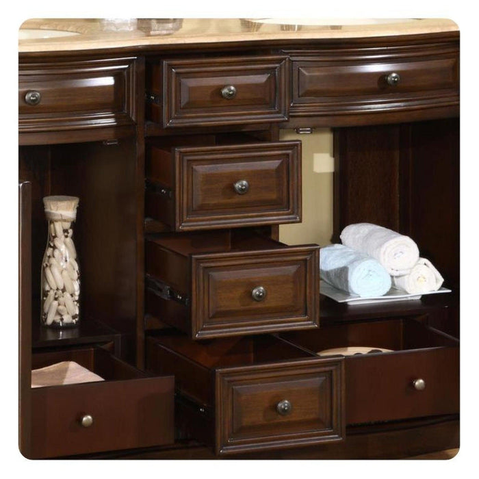 Dark wood bathroom vanity with multiple staggered drawers, rolled white towels, and decorative glass jar with clothespins.