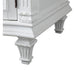 White ornate furniture leg with intricate carved details and classical architectural styling, showing decorative molding and a fluted design.