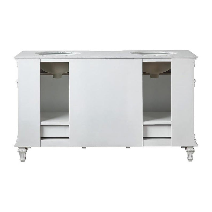White double-sink bathroom vanity with decorative carved feet, two open storage compartments, and marble-like countertop.