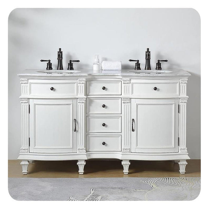 White double-sink bathroom vanity with ornate details, black faucets, and four center drawers