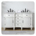White double-sink bathroom vanity with ornate details, black faucets, and four center drawers