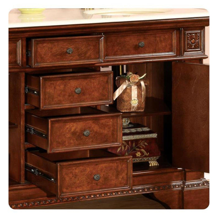 Rich mahogany dresser with multiple open drawers, ornate handles, and a decorative wrapped gift on an interior shelf.