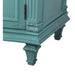 Vintage teal wooden cabinet with ornate carved legs and decorative molding, showing detailed craftsmanship and distressed finish.