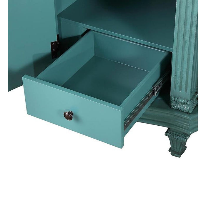 Teal green wooden drawer partially open, showing sliding metal drawer runners and ornate carved wooden leg detail.