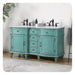 Vintage teal bathroom vanity with marble top, black faucets, and ornate carved details on legs and cabinet