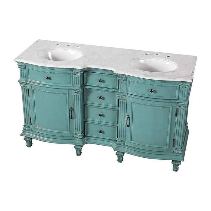 Vintage-style double vanity in teal with curved details, white marble top, and ornate cabinet hardware.