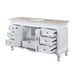 White vintage-style vanity with ornate details, curved legs, and multiple open drawers on marble countertop