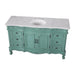 Vintage-style sage green bathroom vanity with curved legs, ornate details, and white marble top with oval sink.