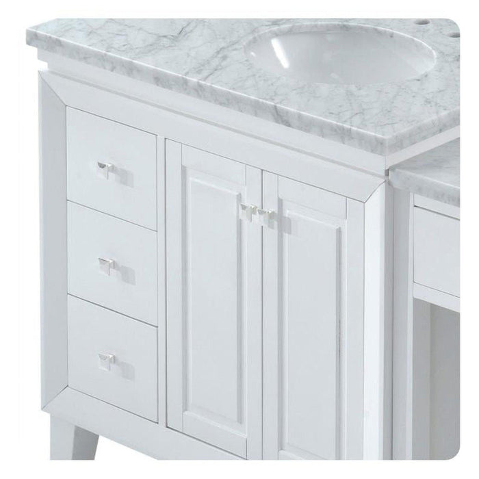 White bathroom vanity with marble countertop, three drawers, and center cabinet with double doors and silver hardware.