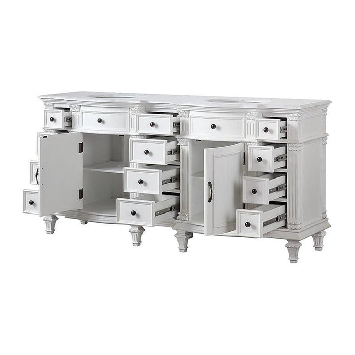 White vintage-style bathroom vanity with multiple open drawers and ornate carved details, featuring decorative legs and cabinet doors.