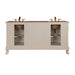 Double vanity with cream-colored cabinet, glass side panels, bronze faucets, and decorative claw feet.