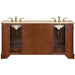 Double-sink wooden bathroom vanity with marble top and brass faucets, warm brown finish with elegant design