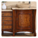 Elegant wooden bathroom vanity with burl wood drawers, stone vessel sink, and white ceramic vase.