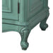 Vintage seafoam green cabinet with ornate curved legs and decorative hinged door, showing distressed paint finish.