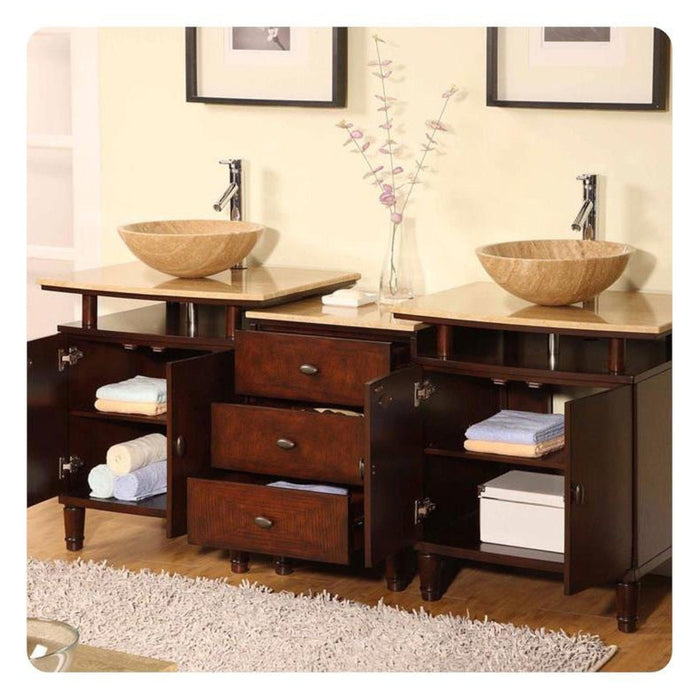 Bathroom vanity with two stone vessel sinks, dark wood cabinets, open shelves with towels, and pink floral branch decor.