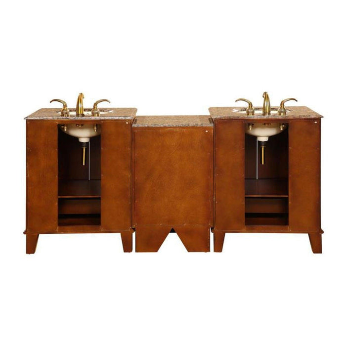 Wooden double bathroom vanity with granite top, two sinks, and brass faucets, featuring rich brown cabinets with open shelving.