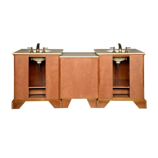 Wooden bathroom vanity with two sinks, white marble countertop, and bronze faucets, featuring open cabinet spaces on sides.