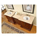 Dark wood double vanity with cream marble countertop, two white sinks, and decorative artwork on beige wall.