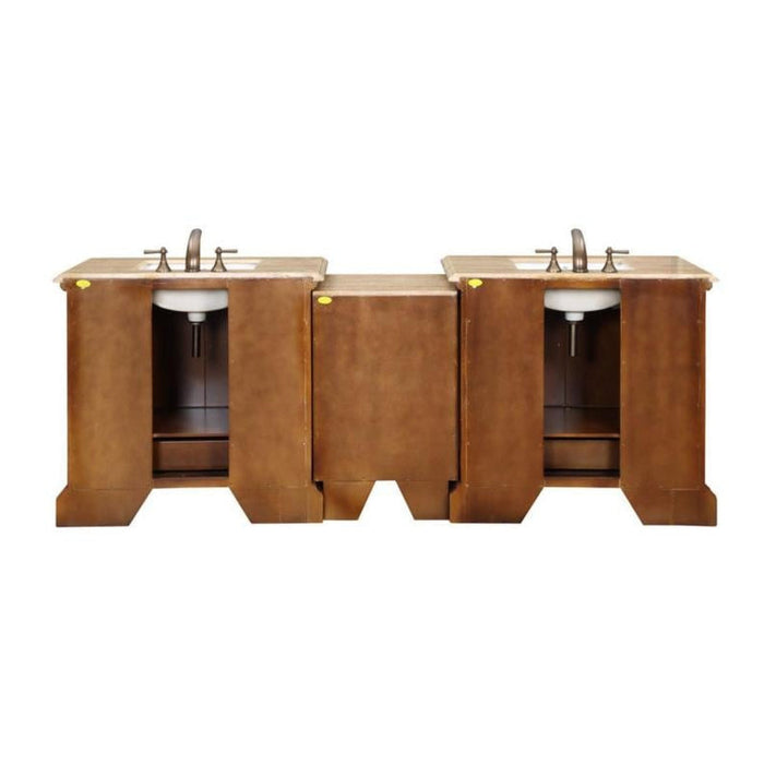 Double bathroom vanity with wood cabinets, marble countertop, white undermount sinks, and bronze faucets.