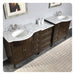 Dark brown double bathroom vanity with white marble top, two sinks, and decorative geometric floor rug