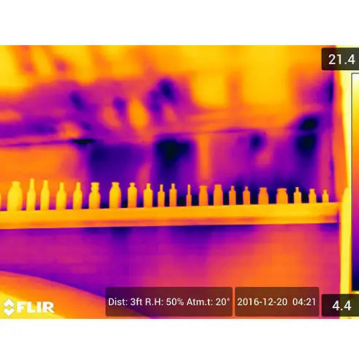 Teledyne FLIR A400 IS DFOV 42 24 thermal image bottle line with temperature data overlay.