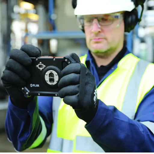 Teledyne FLIR CX5 Hazardous Location Rated Compact Thermal Camera worker holding camera facing forward.